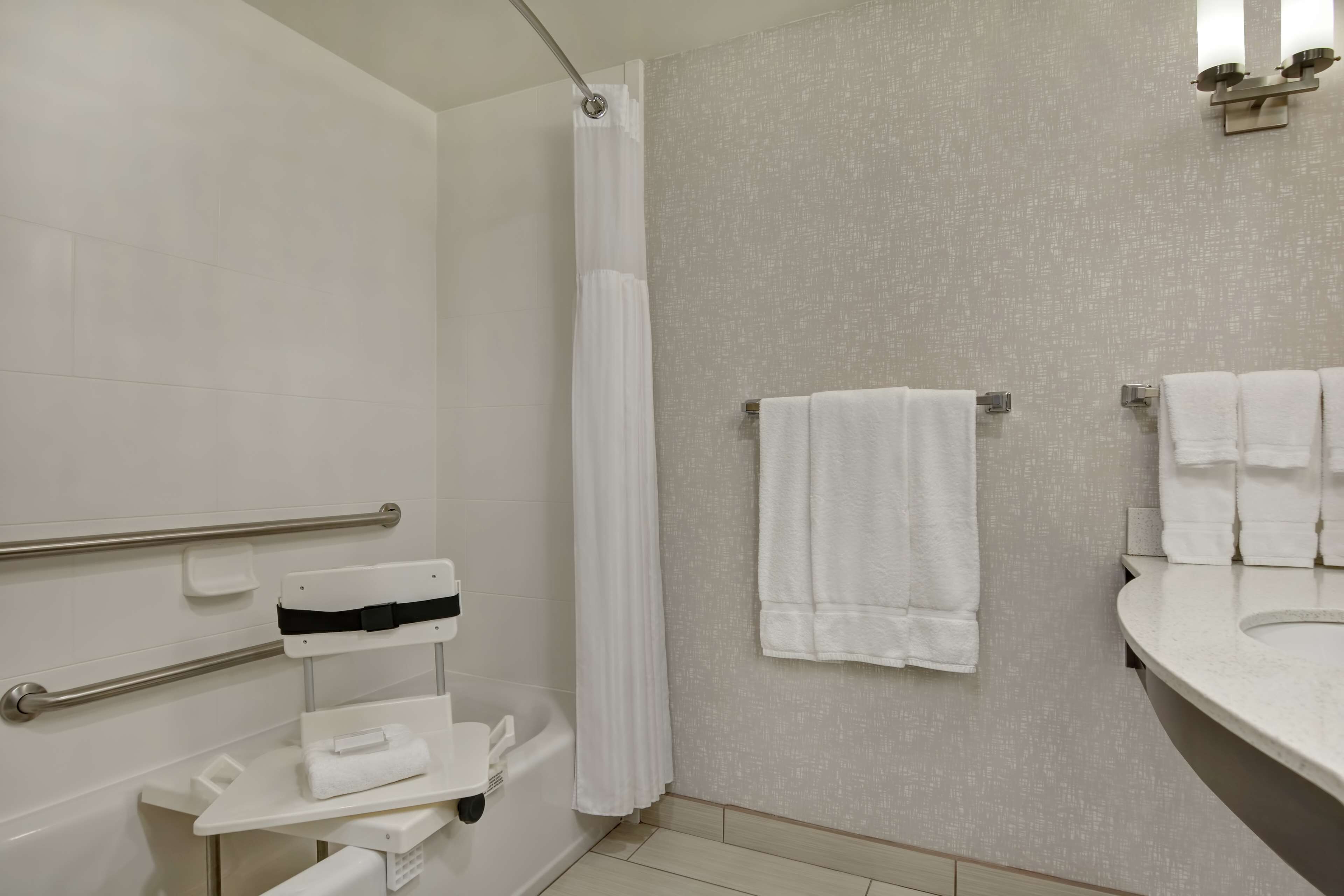 combined shower/bathtub, free toiletries, hair dryer, towels