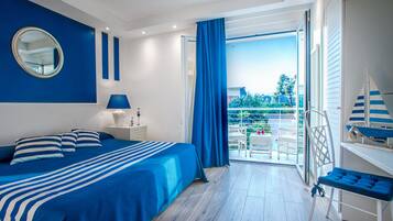 Kahden hengen standard-huone (yksi tai kaksi sänkyä), näköala puutarhaan | Ylelliset vuodevaatteet, minibaari, tallelokero huoneessa