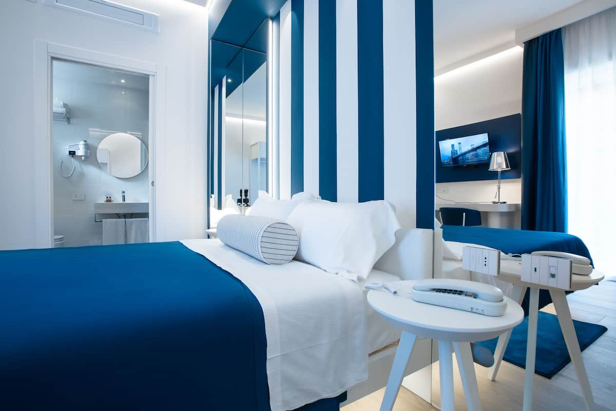 standard double or twin room, garden view | premium bedding, minibar, in-room safe, individually furnished