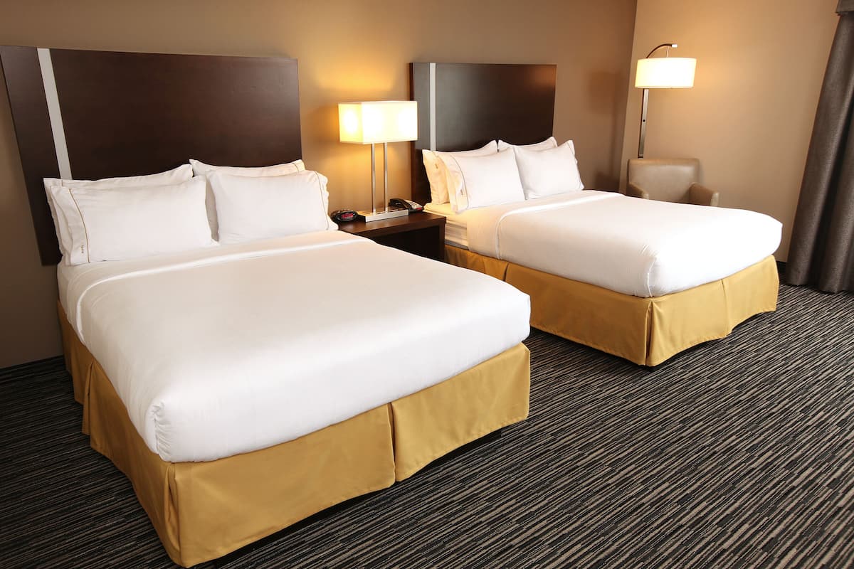 Premium bedding, down comforters, desk, laptop workspace