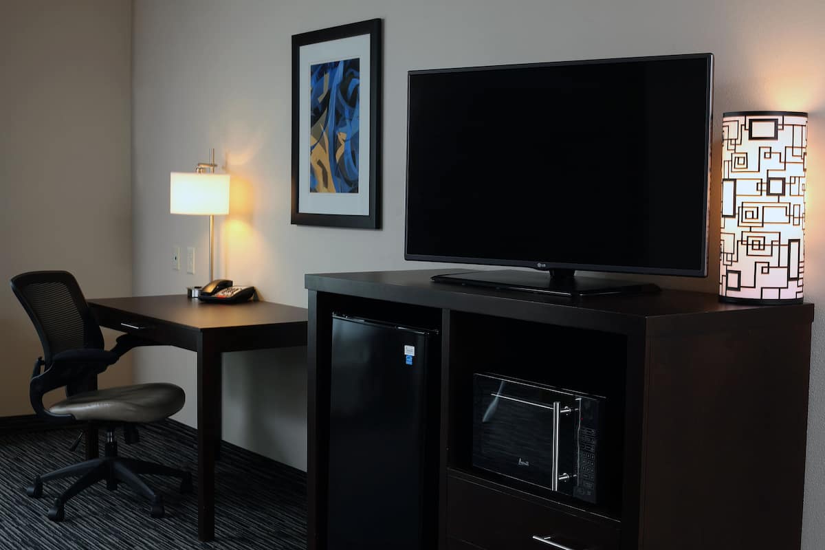 Premium bedding, down comforters, desk, laptop workspace