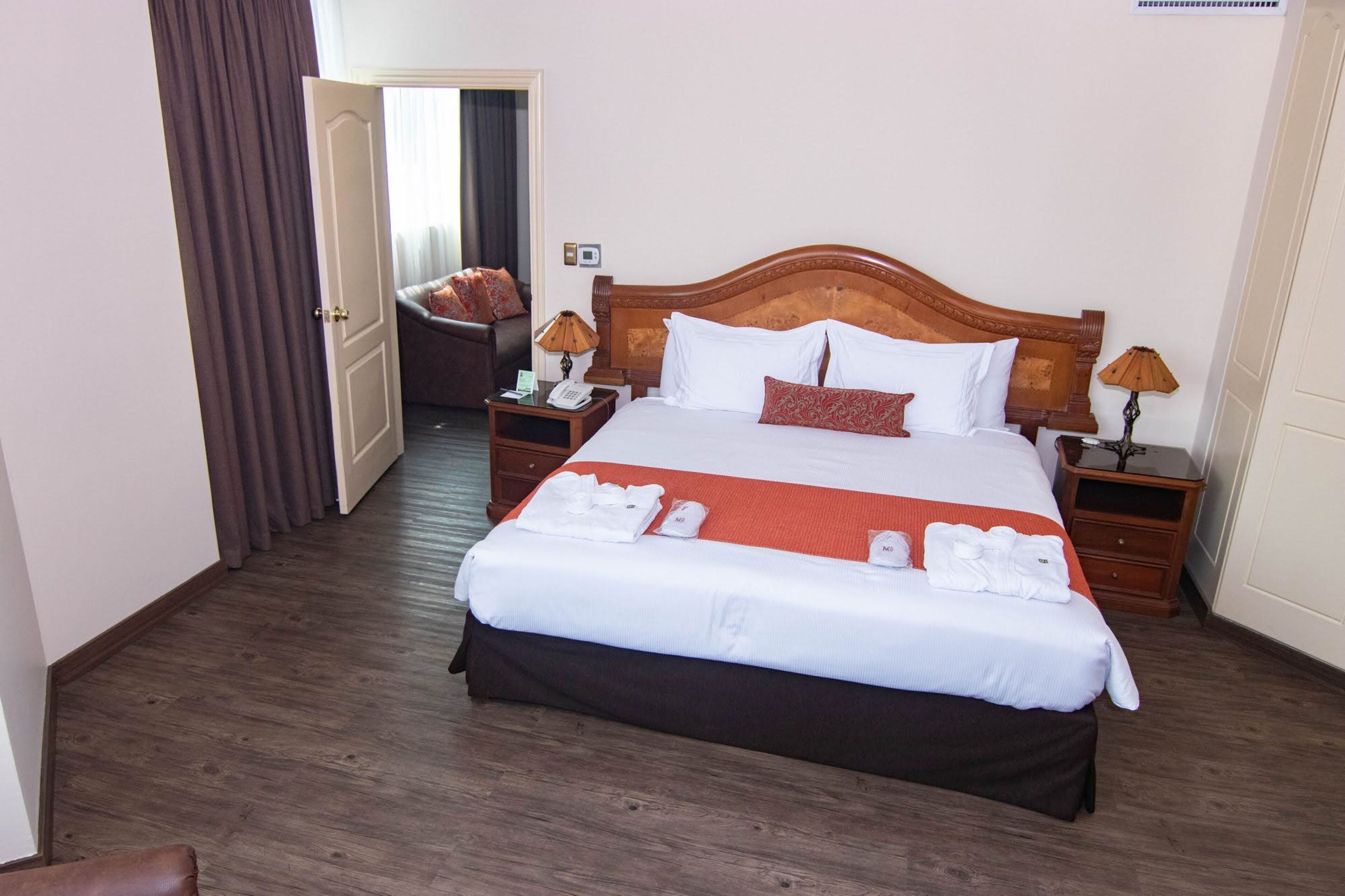 senior suite | premium bedding, minibar, in-room safe, iron/ironing board