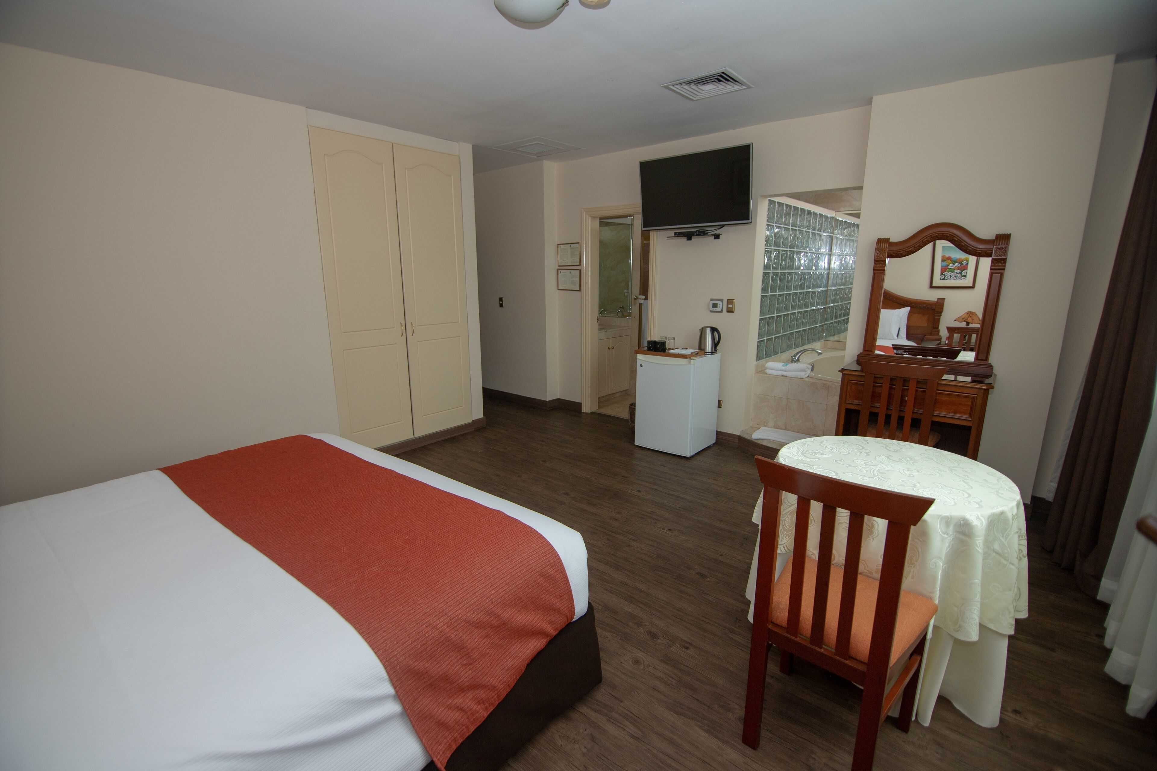 junior suite | premium bedding, minibar, in-room safe, iron/ironing board