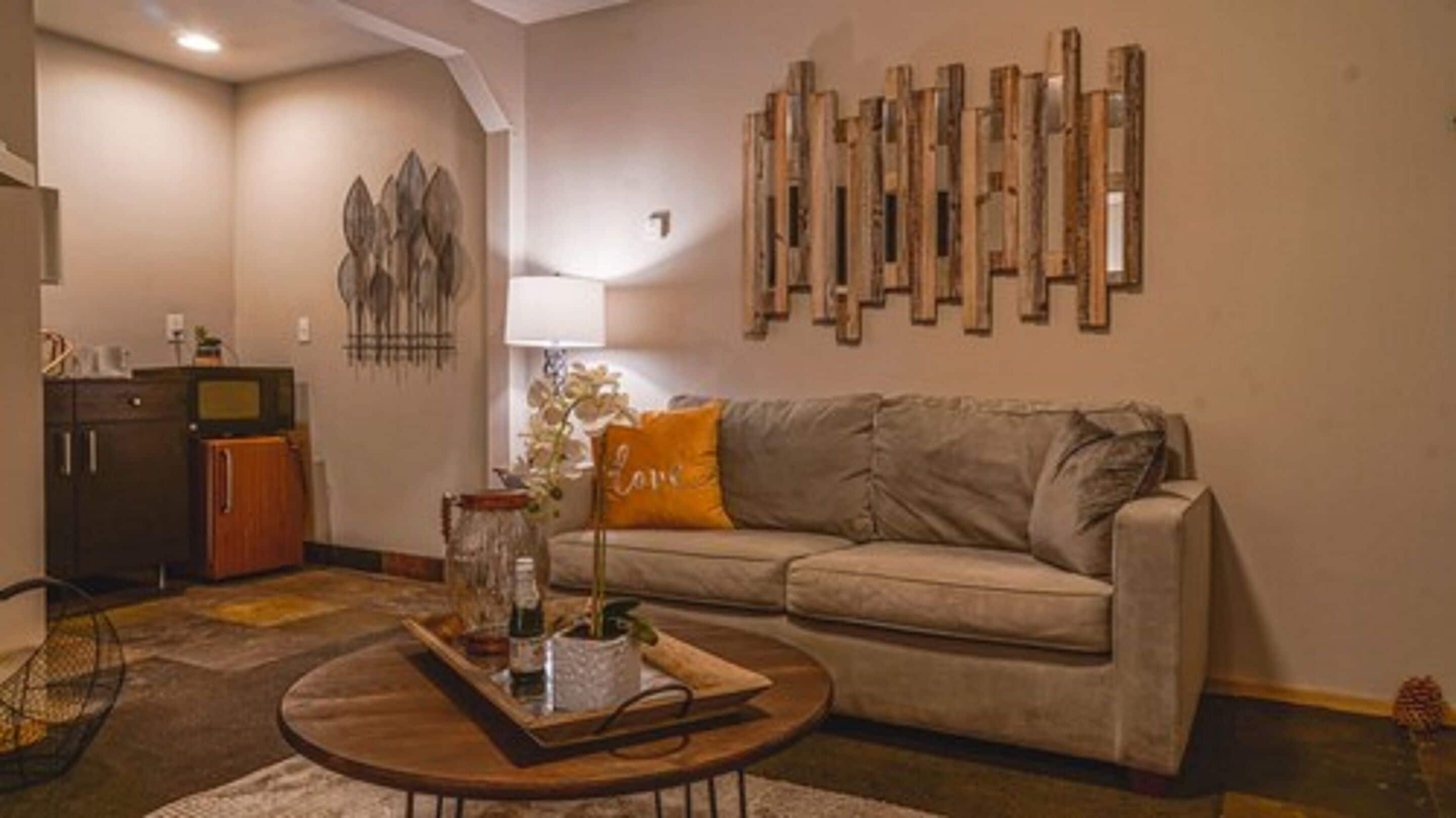 deluxe suite, 1 king bed | living area | 50-inch smart tv with digital channels, tv, netflix