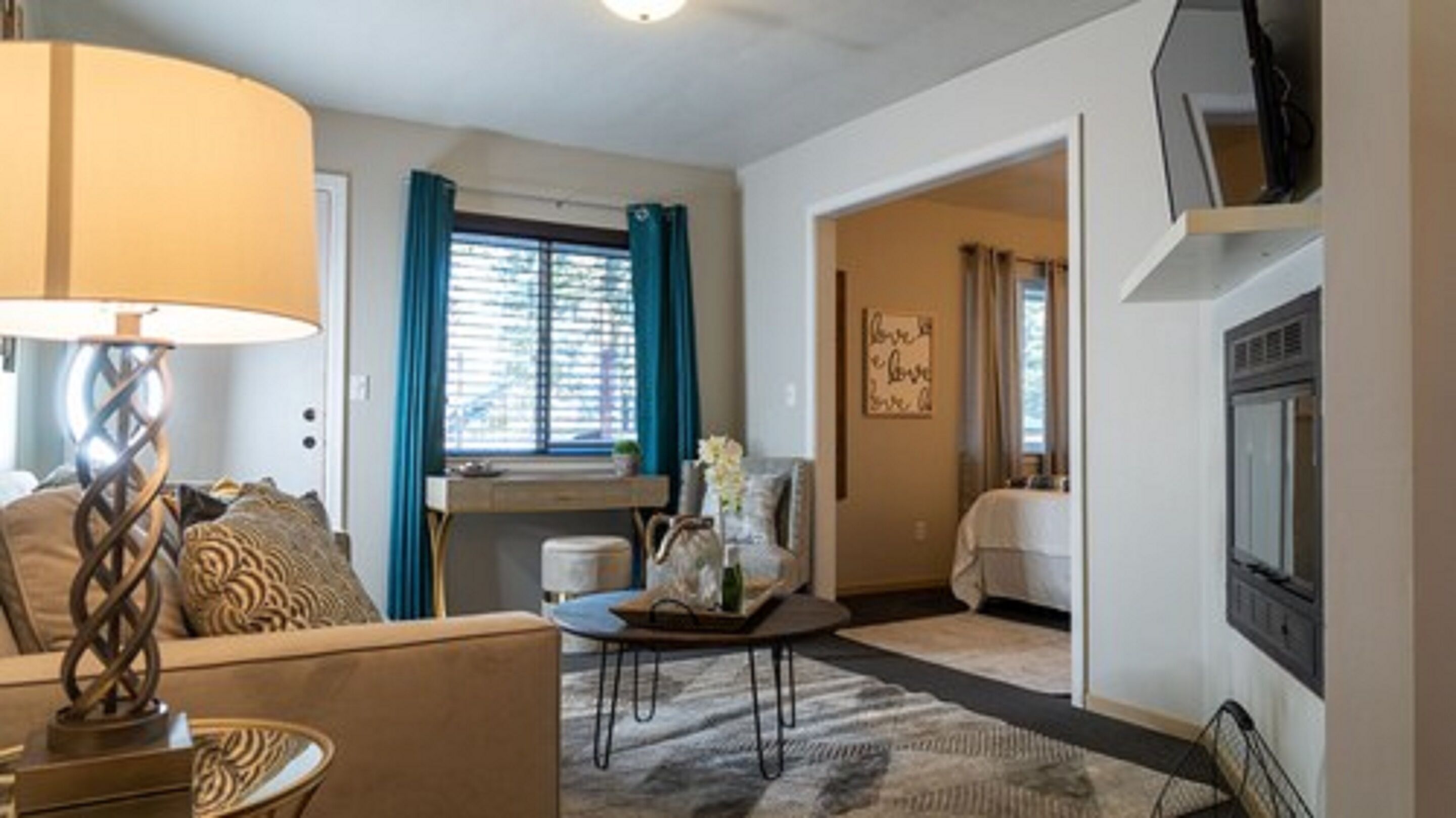 deluxe suite, 1 king bed | living area | 50-inch smart tv with digital channels, tv, netflix