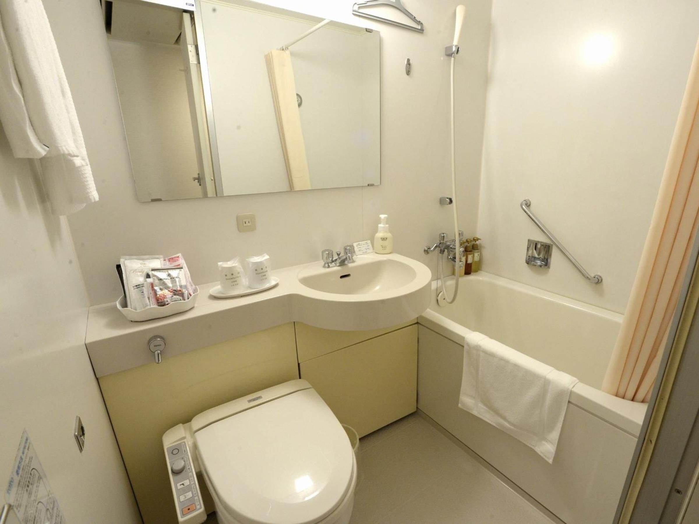 shower, free toiletries, hair dryer, slippers