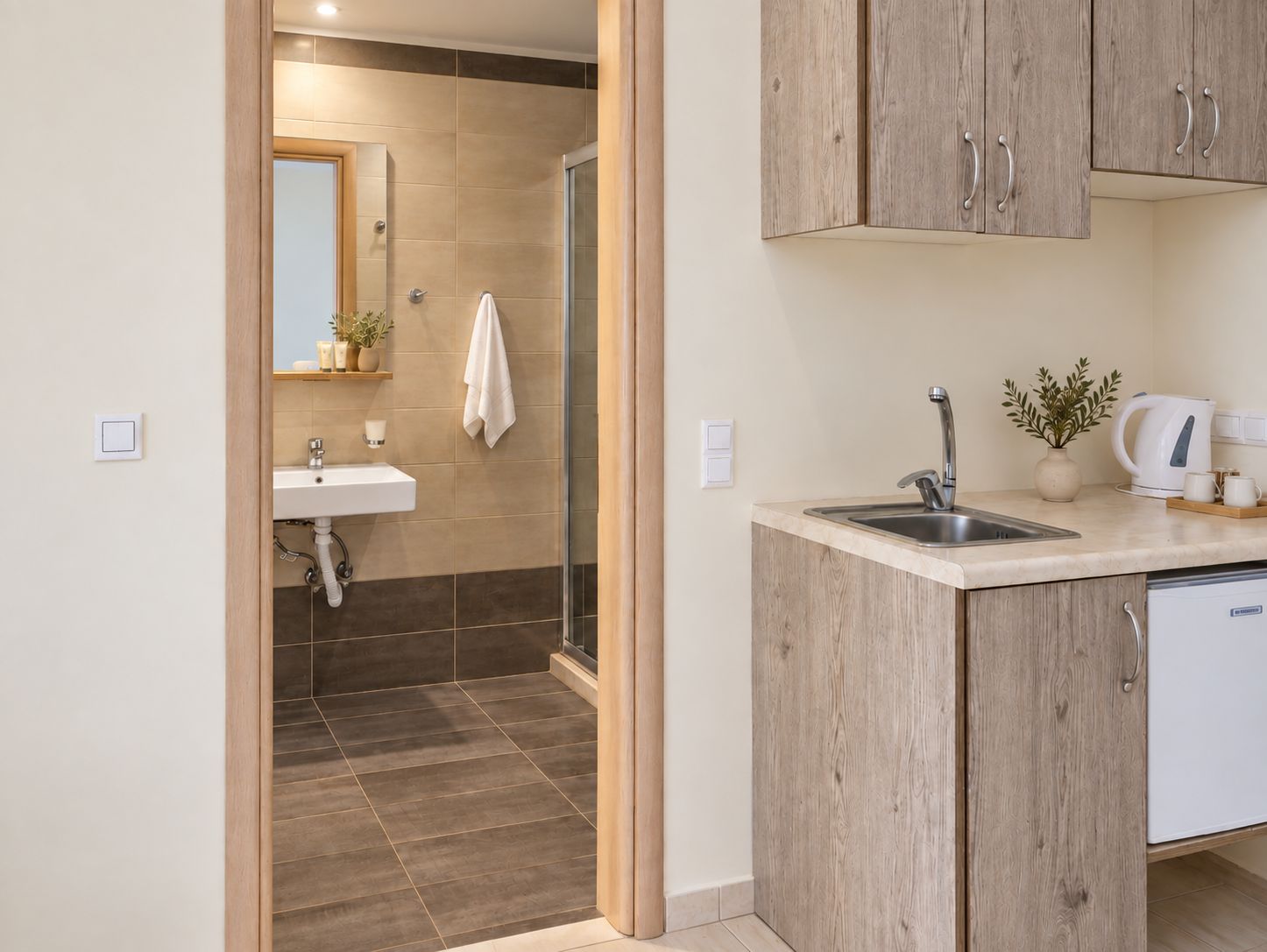 A modern bathroom with a shower, sink, and a mirror.