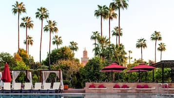 2 outdoor pools, open 10:00 AM to 6:00 PM, pool umbrellas, pool loungers