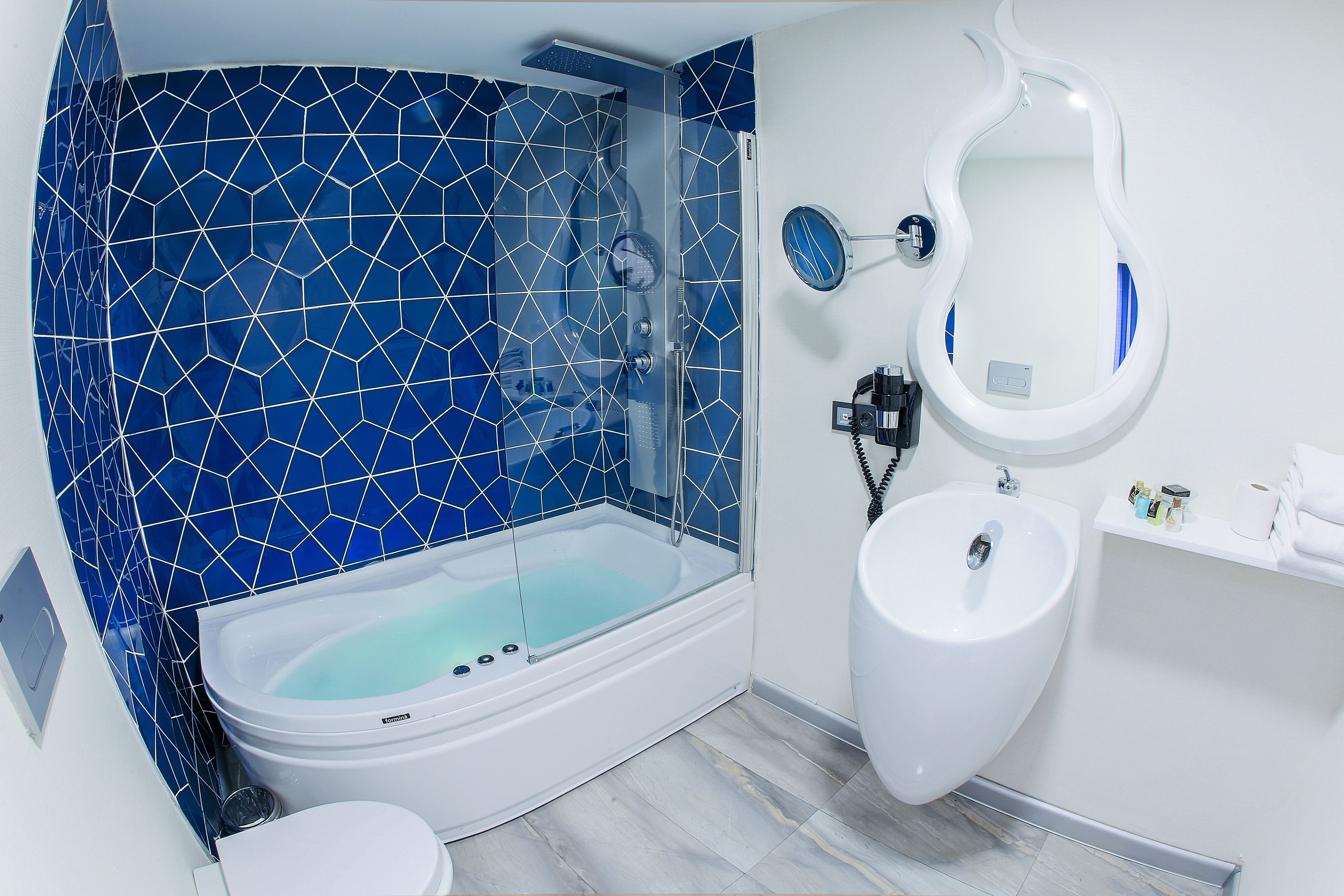 combined shower/bathtub, jetted bath, hair dryer, slippers