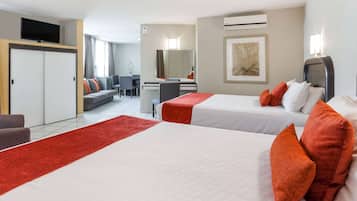 Suite junior, 2 camas matrimoniales, para no fumadores | 1 habitación, ropa de cama de alta calidad y edredón