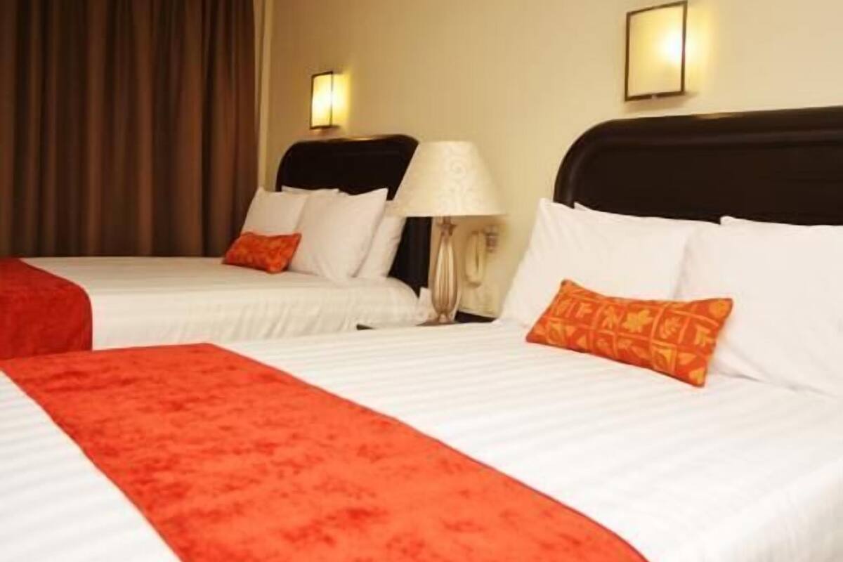 Premium bedding, down duvets, in-room safe, individually furnished