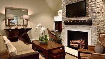 Premium Suite, 1 King Bed (Louis Baker Suite - Mews) | Living area | Flat-screen TV