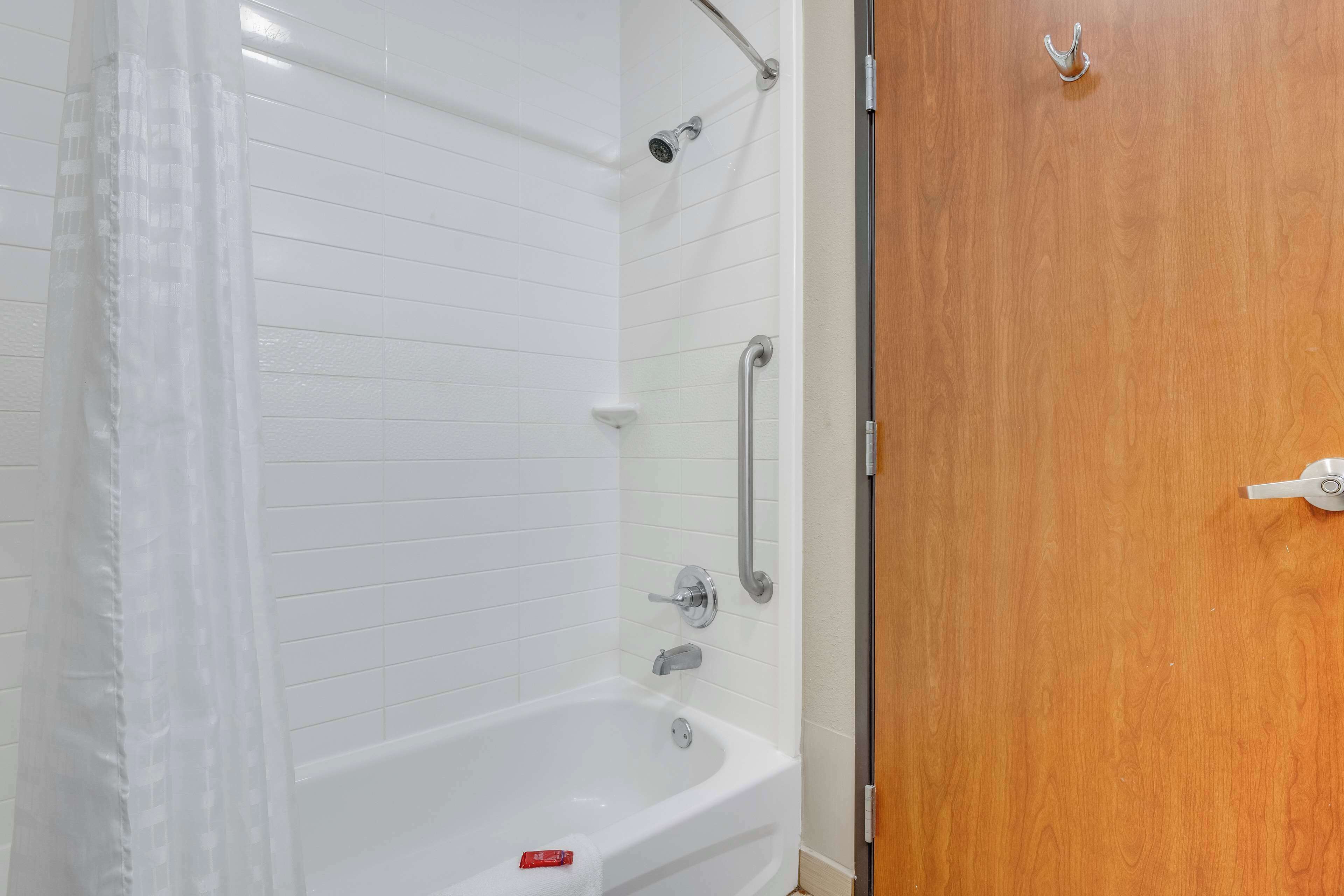 designer toiletries, hair dryer, towels, soap