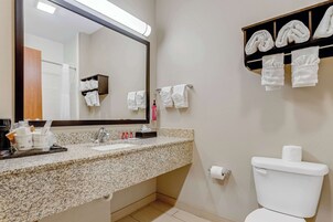 Designer toiletries, hair dryer, towels, soap