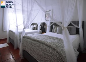 Double Room | Living room | 55-inch TV with digital channels - Boho Beach Club (Cabo Rojo)