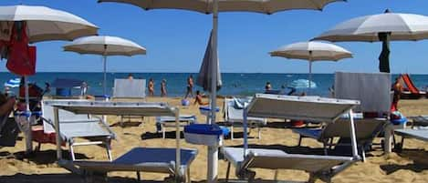 Private beach nearby, sun loungers, beach umbrellas