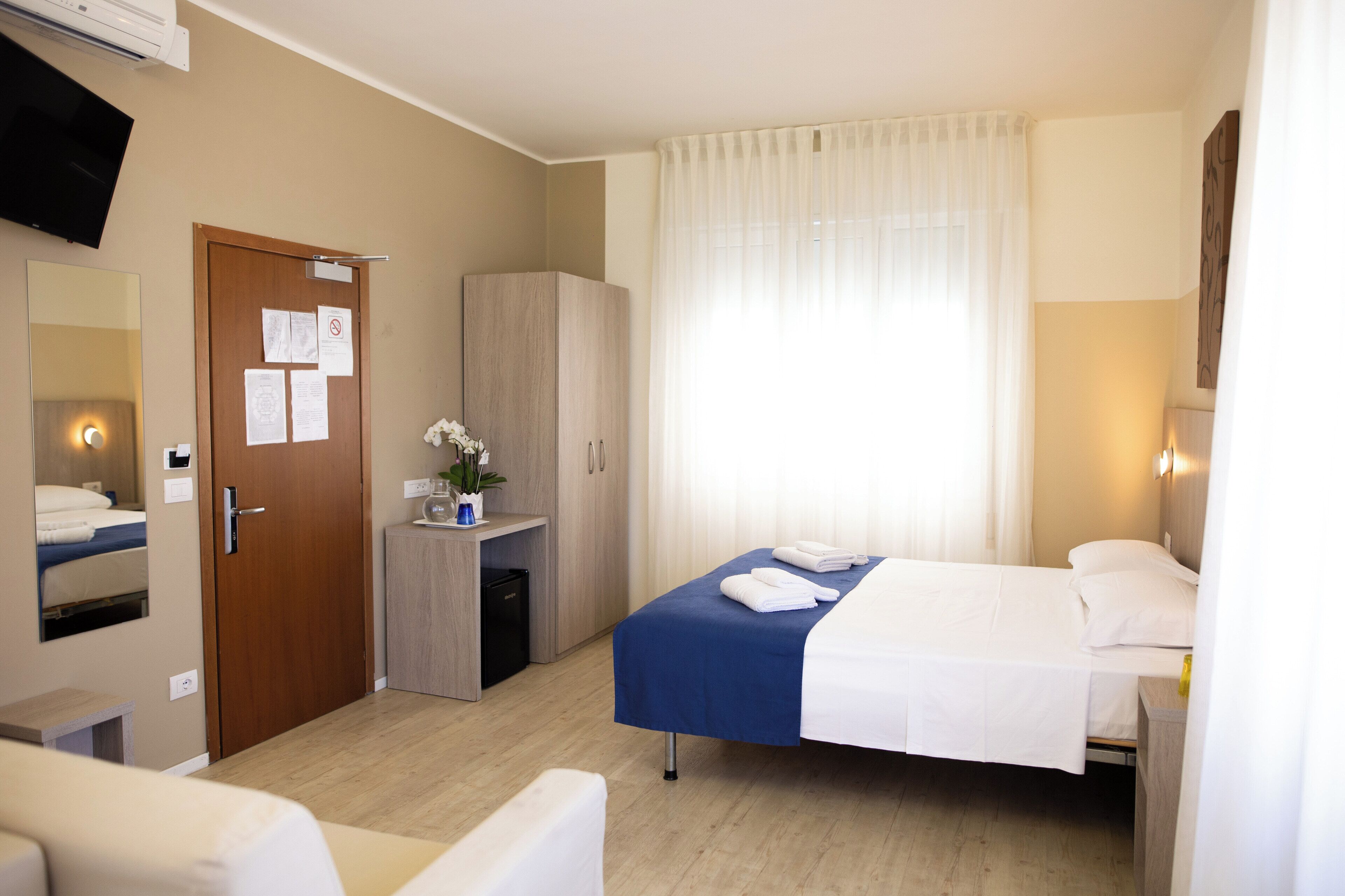 basic quadruple room | 1 bedroom, in-room safe, desk, cots/infant beds