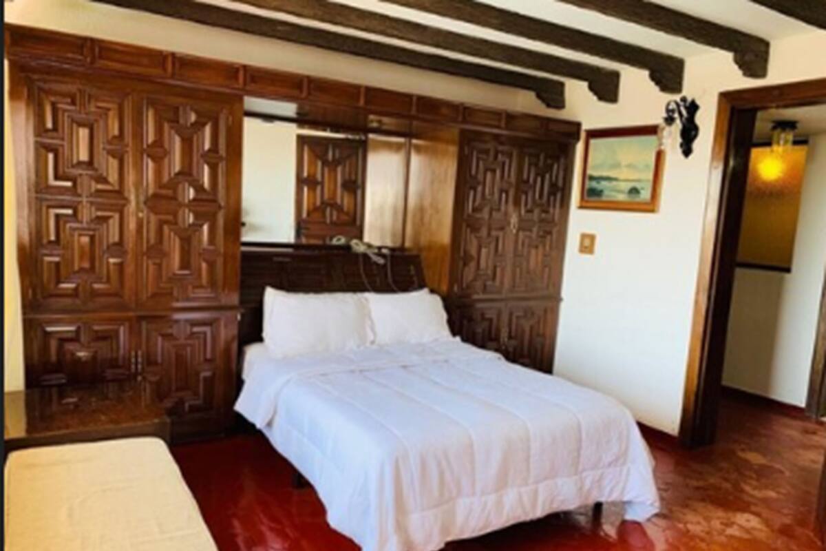 Suite superior, 2 camas dobles | Caja fuerte y ropa de cama