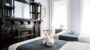 Standard Triple Room with Shared Bathroom | Egyptian cotton sheets, in-room safe, individually decorated