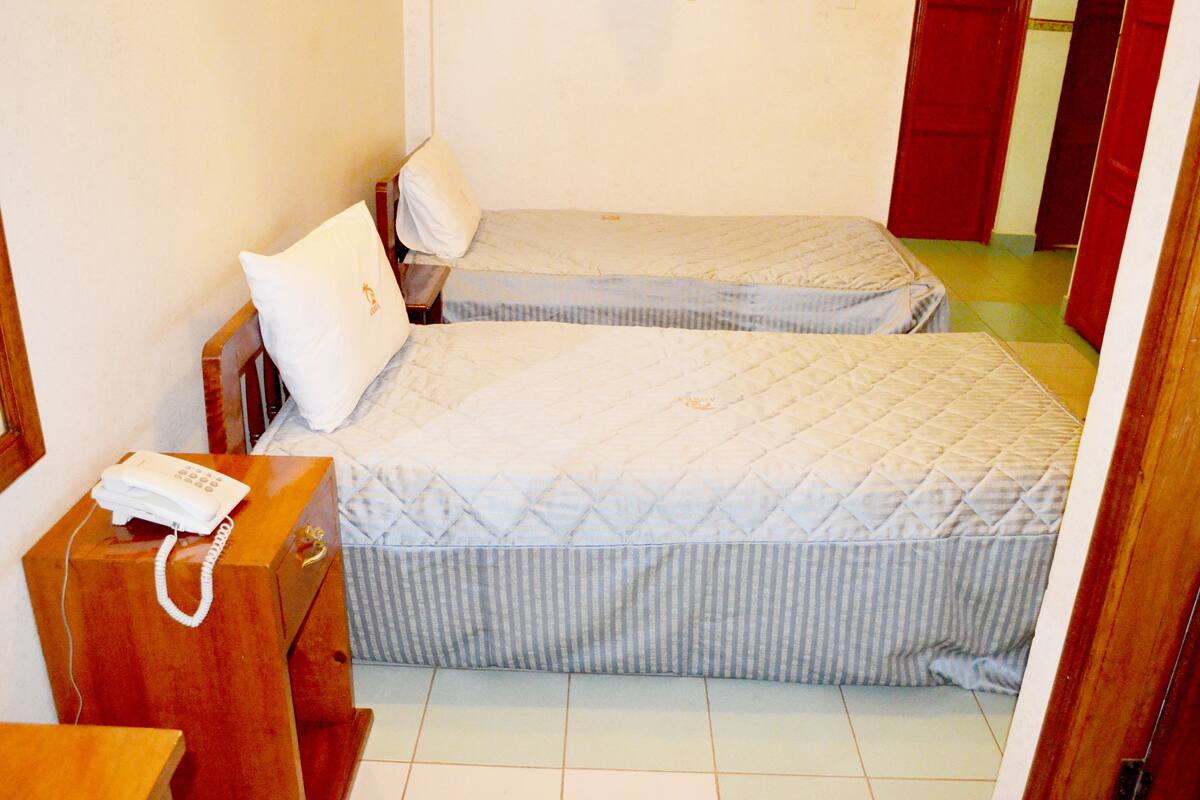 Twin Room | Desk, blackout drapes, soundproofing, iron/ironing board (on request)
