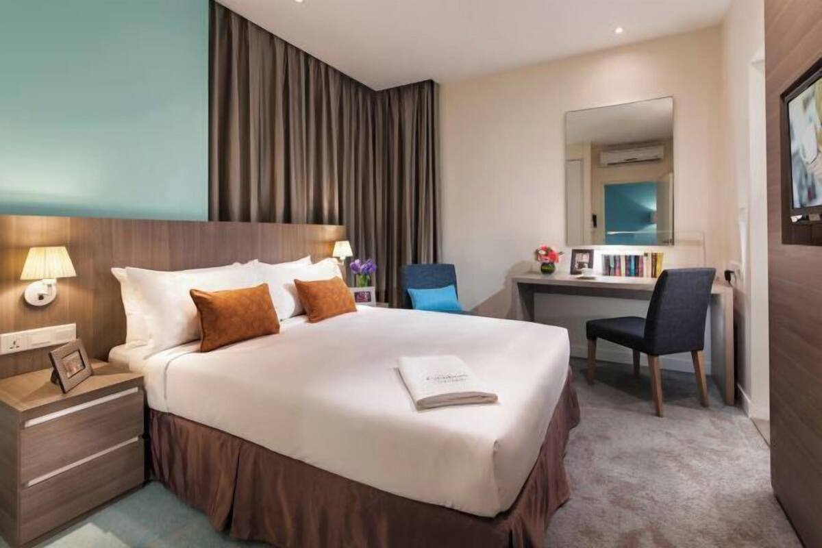 Premium bedding, down duvets, in-room safe, desk
