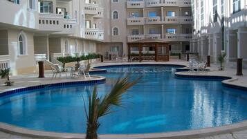 Outdoor pool, sun loungers