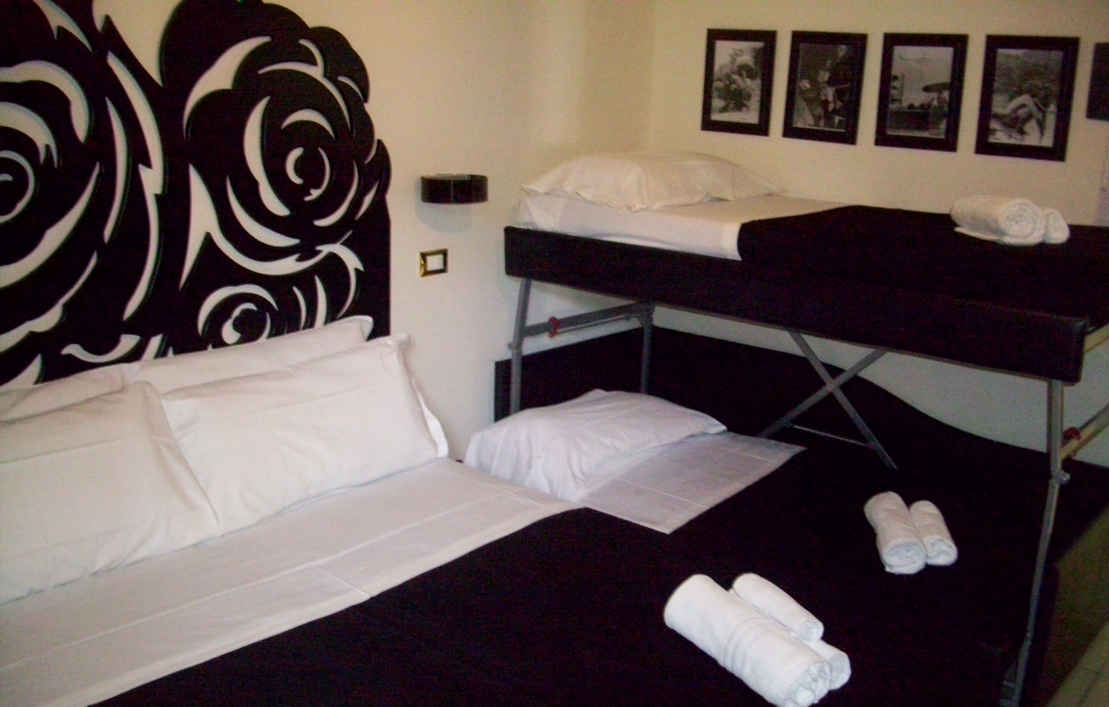 family room | 1 bedroom, minibar, in-room safe, individually decorated