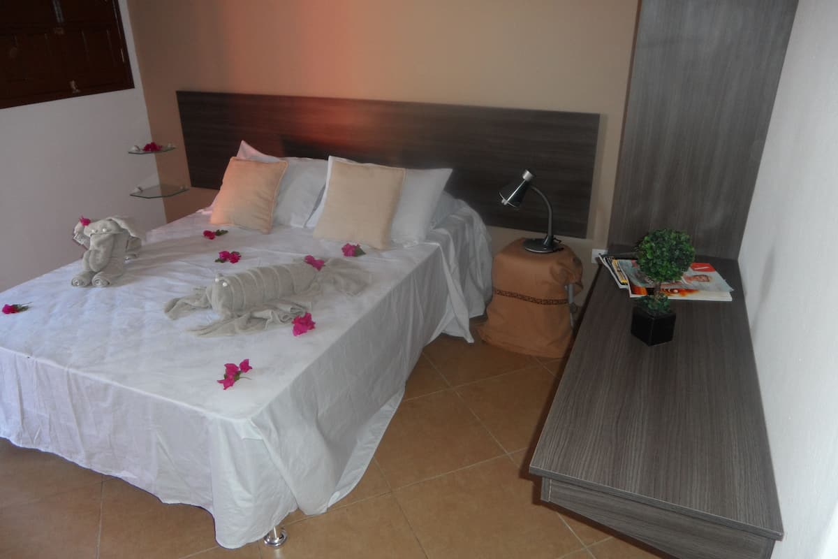 Blackout drapes, WiFi (free), bed sheets