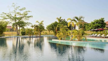 Outdoor pool, pool umbrellas, sun loungers