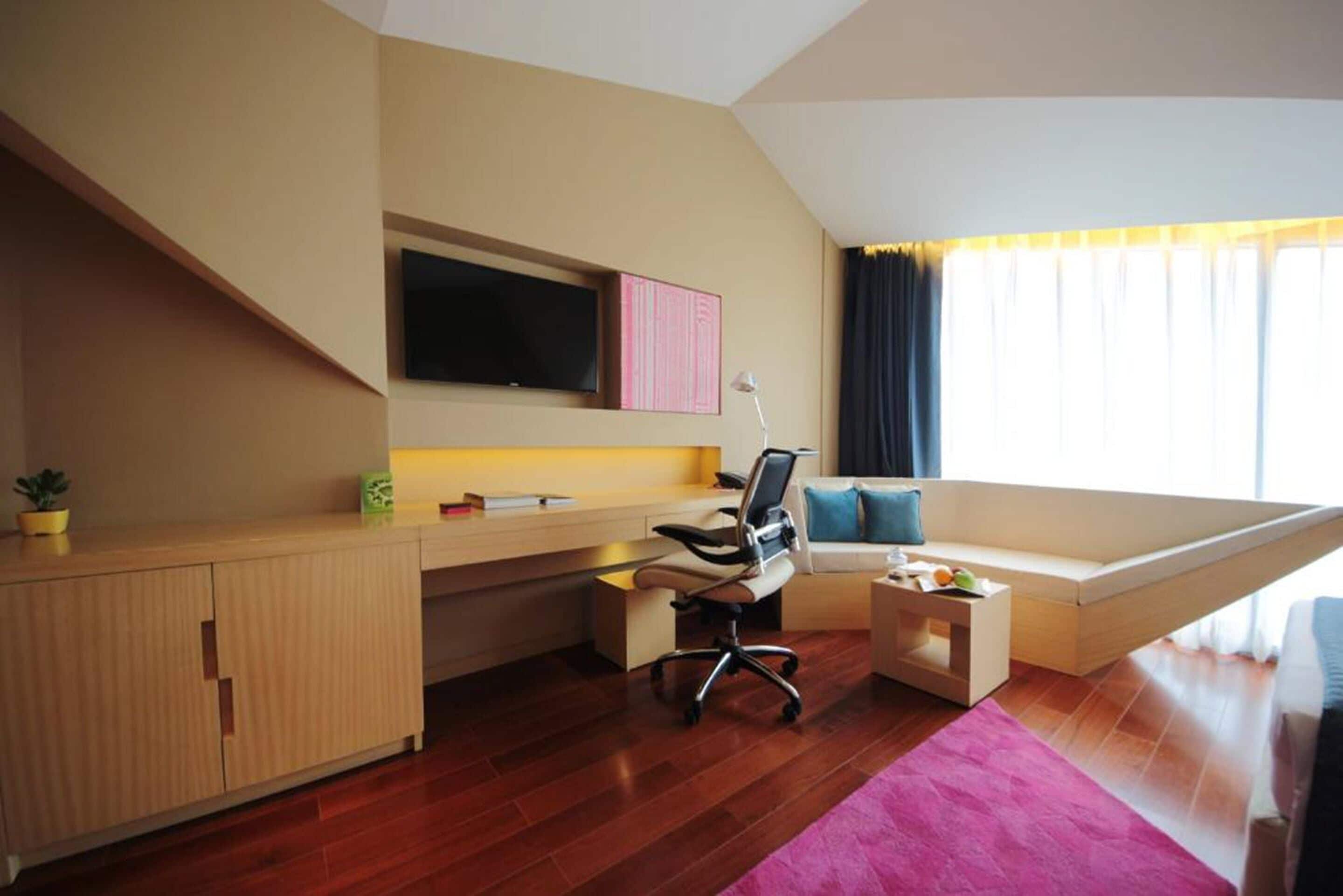 deluxe suite, 1 bedroom, city view (allure) | minibar, in-room safe, desk, laptop workspace