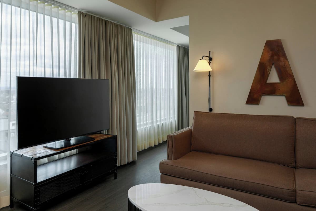 Suite, 1 Bedroom (Lounge Access) | Living area | 37-inch flat-screen TV with cable channels, TV