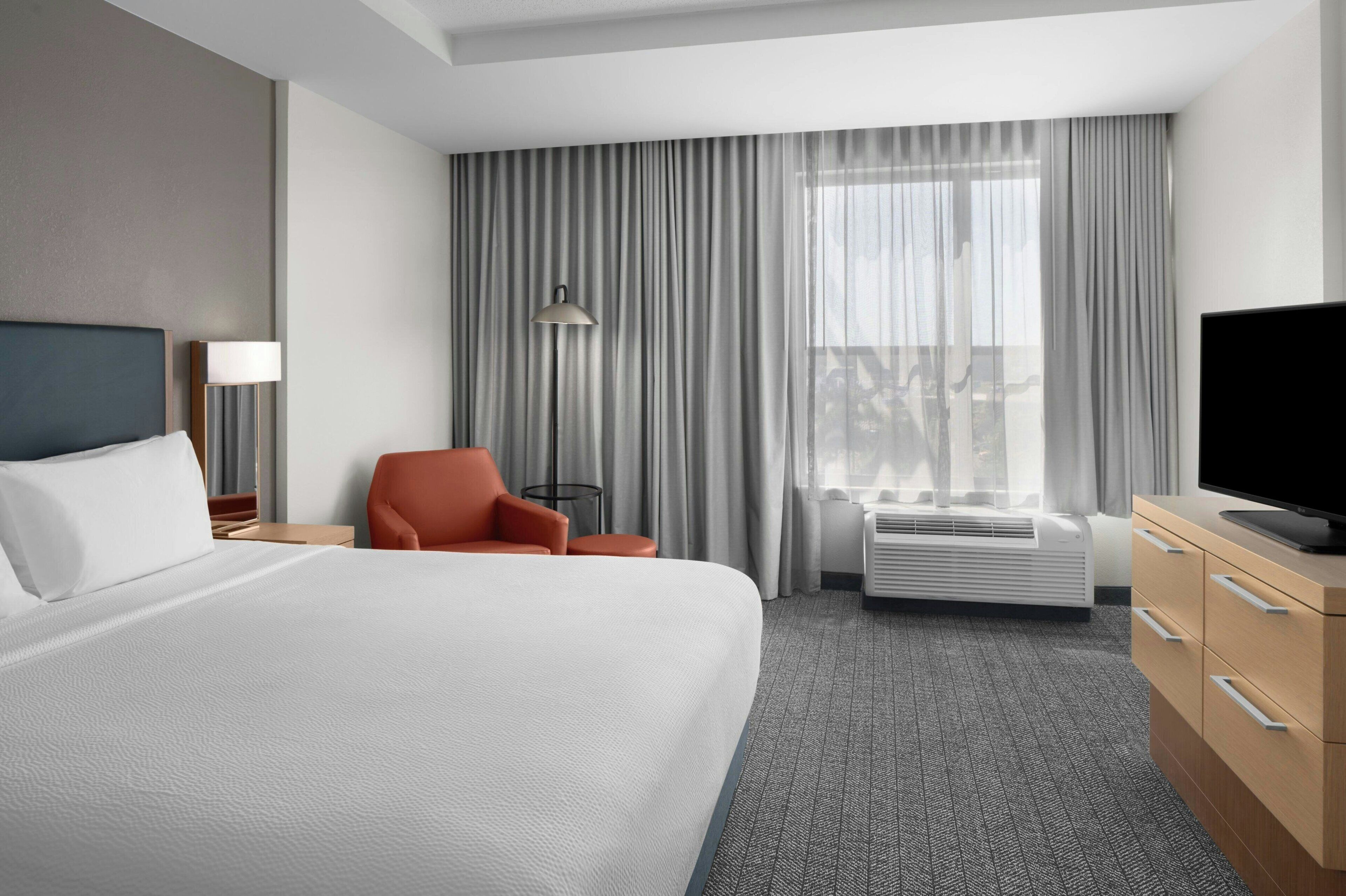 premium bedding, desk, laptop workspace, iron/ironing board