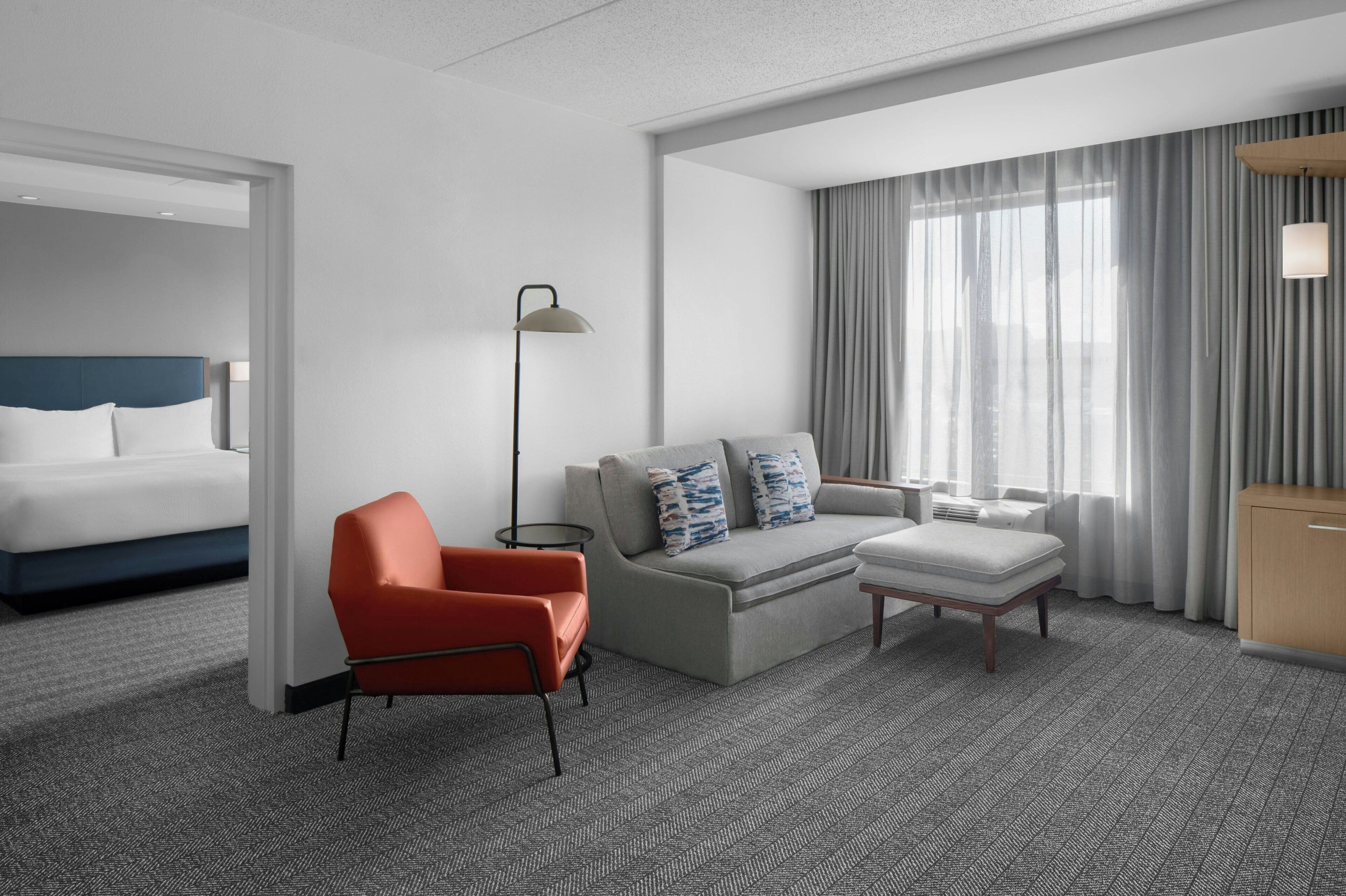 premium bedding, desk, laptop workspace, iron/ironing board