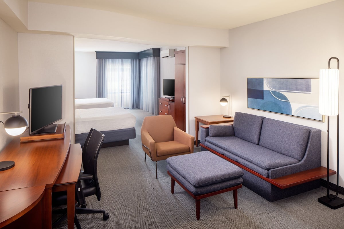 room, multiple beds | premium bedding, in-room safe, desk, blackout curtains