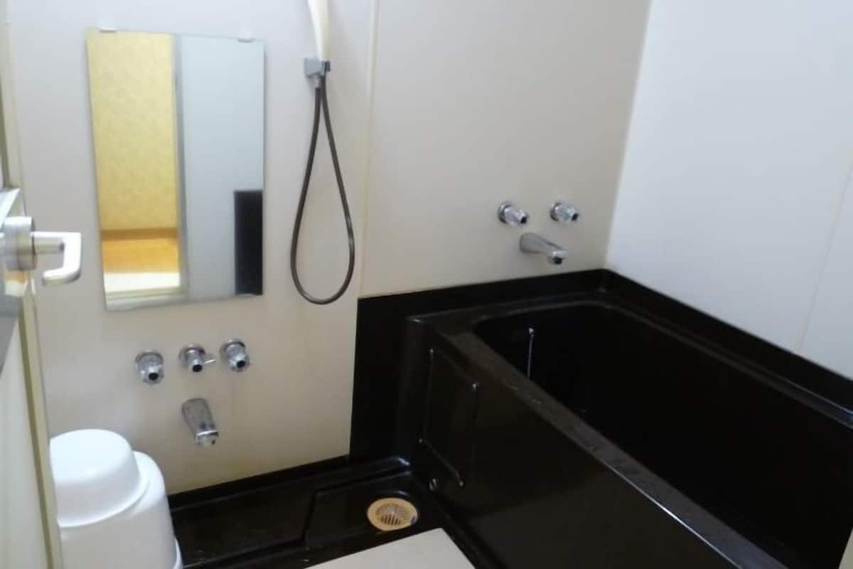 Bathroom | Free toiletries, hair dryer, slippers, bidet