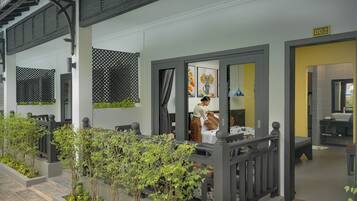 Deluxe Double Room, Poolside | Minibar, in-room safe, desk, iron/ironing board