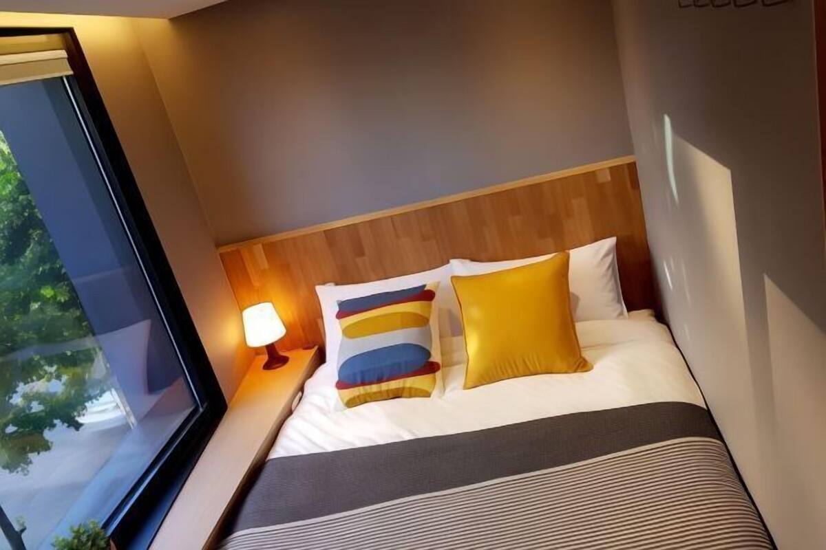 Premium bedding, blackout curtains, soundproofing, free WiFi