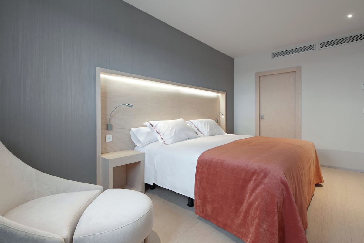 Premium bedding, down duvets, Select Comfort beds, in-room safe