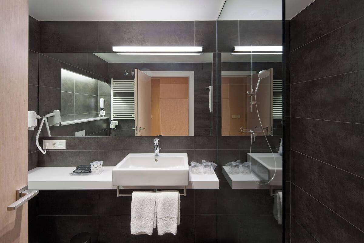 free toiletries, hair dryer, towels, soap