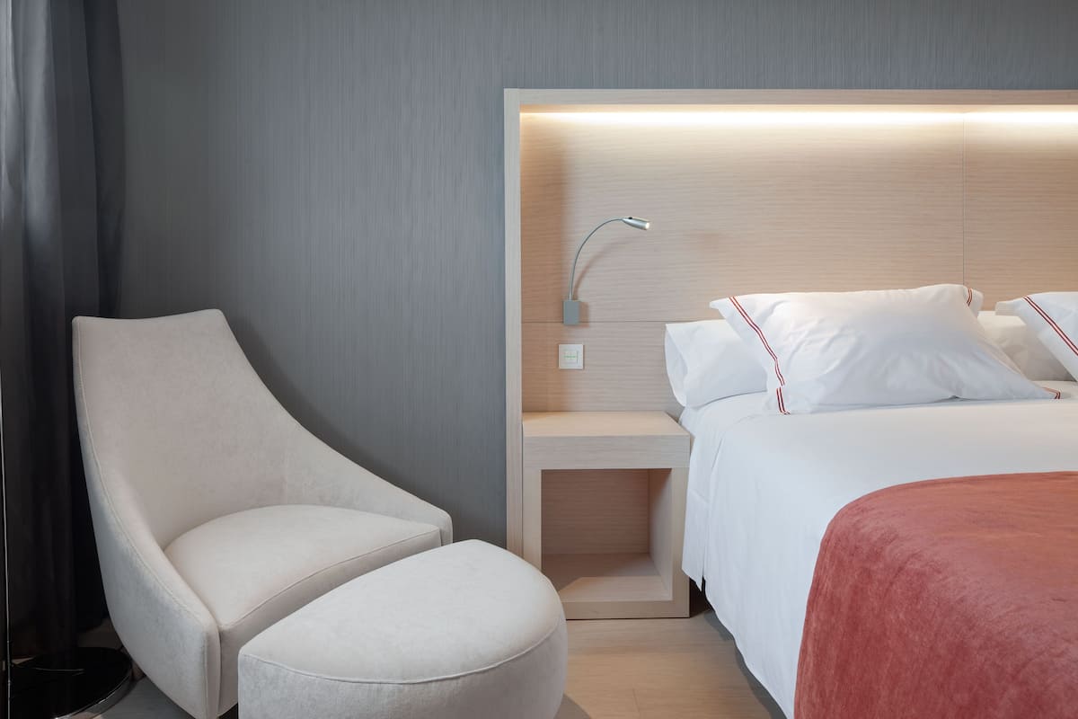 Premium bedding, down duvets, Select Comfort beds, in-room safe