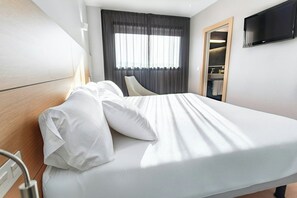 Habitación familiar | Ropa de cama de alta calidad, edredón y camas Select Comfort 