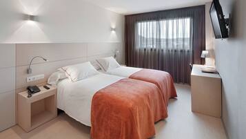 Premium bedding, down duvets, Select Comfort beds, in-room safe