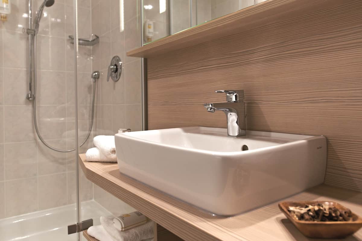 deep-soaking bathtub, free toiletries, hair dryer, slippers