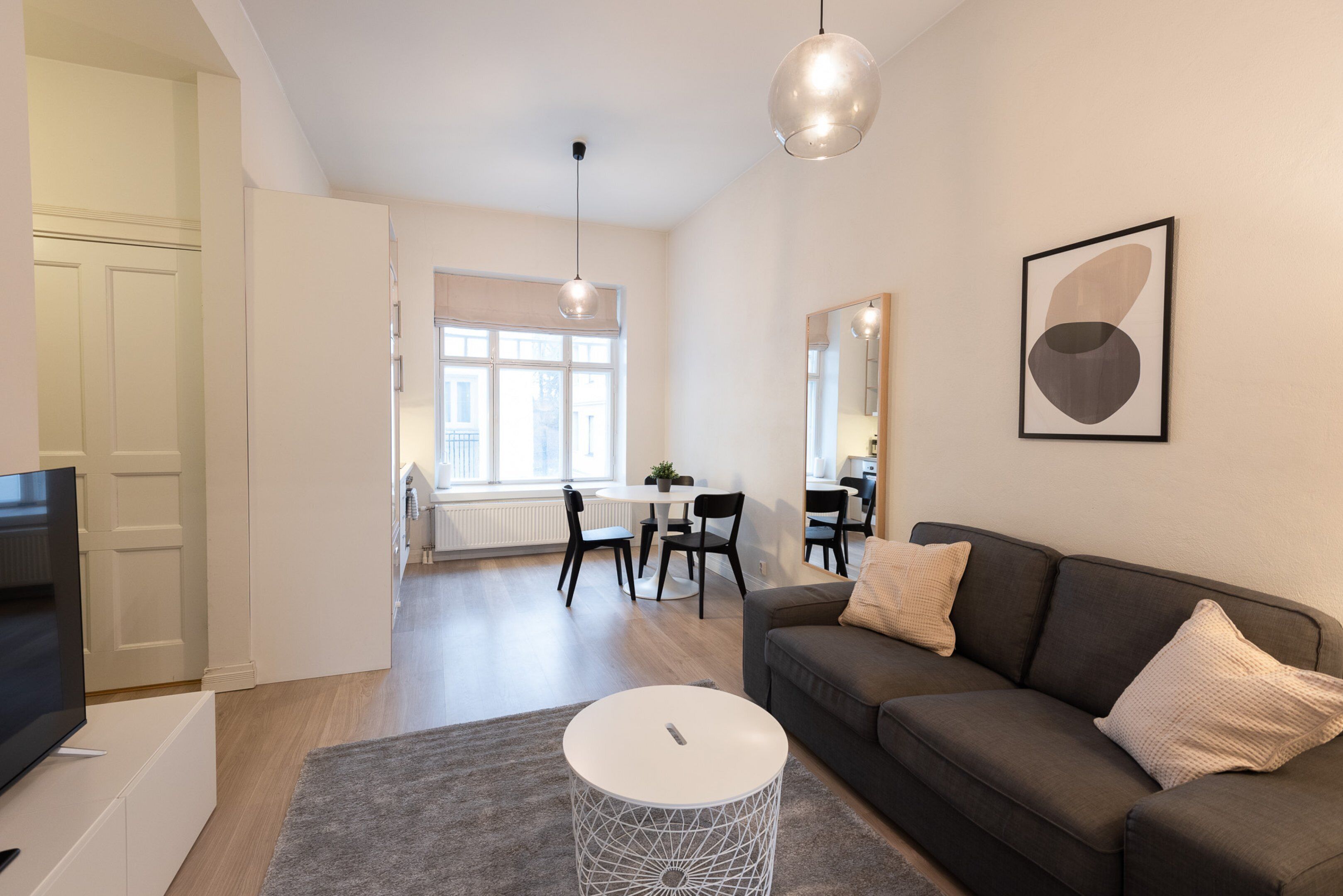 Basic Apartment | Living area | 32-inch TV with cable channels