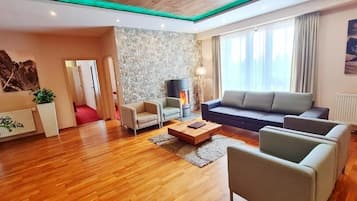 Exclusive Apartment, 2 Bedrooms, Fireplace | Living area | LCD TV, fireplace