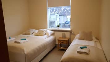 Triple Room, Shared Bathroom | Blackout drapes, free WiFi