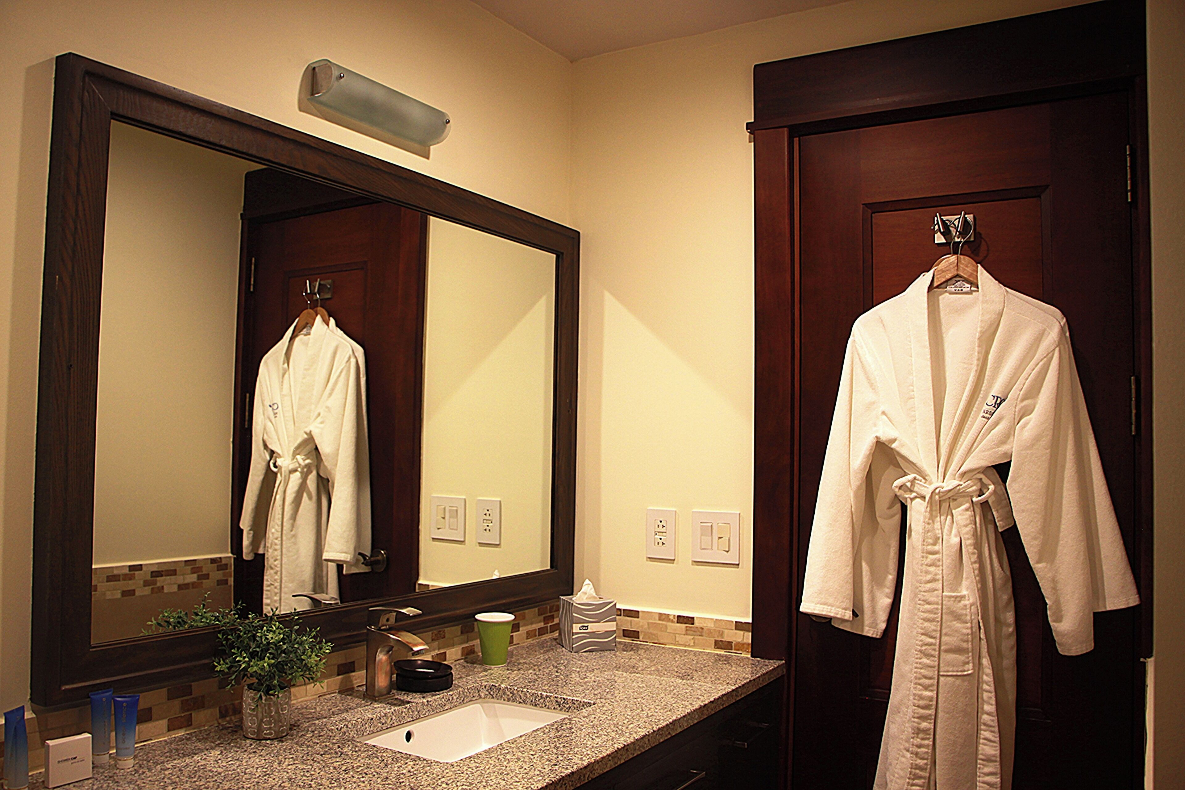 studio suite, 1 king bed | bathroom | free toiletries, hair dryer, bathrobes, towels