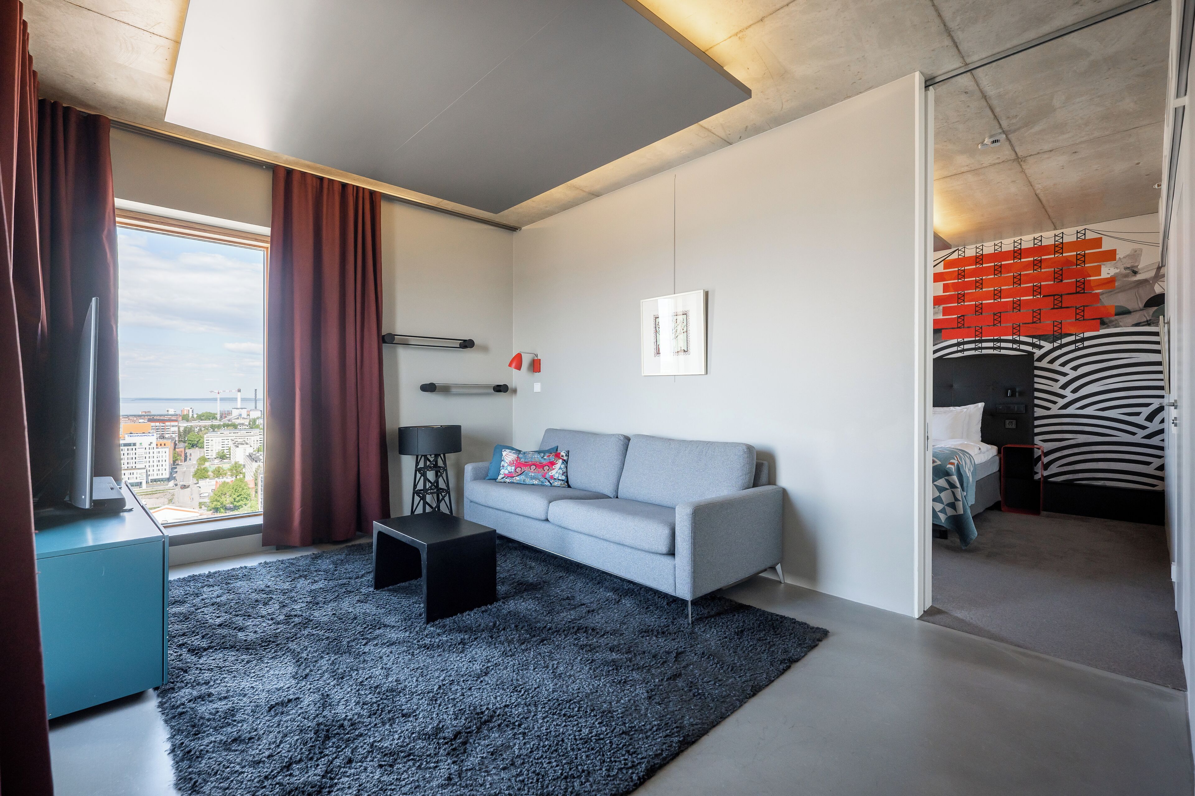 junior suite | living area | flat-screen tv