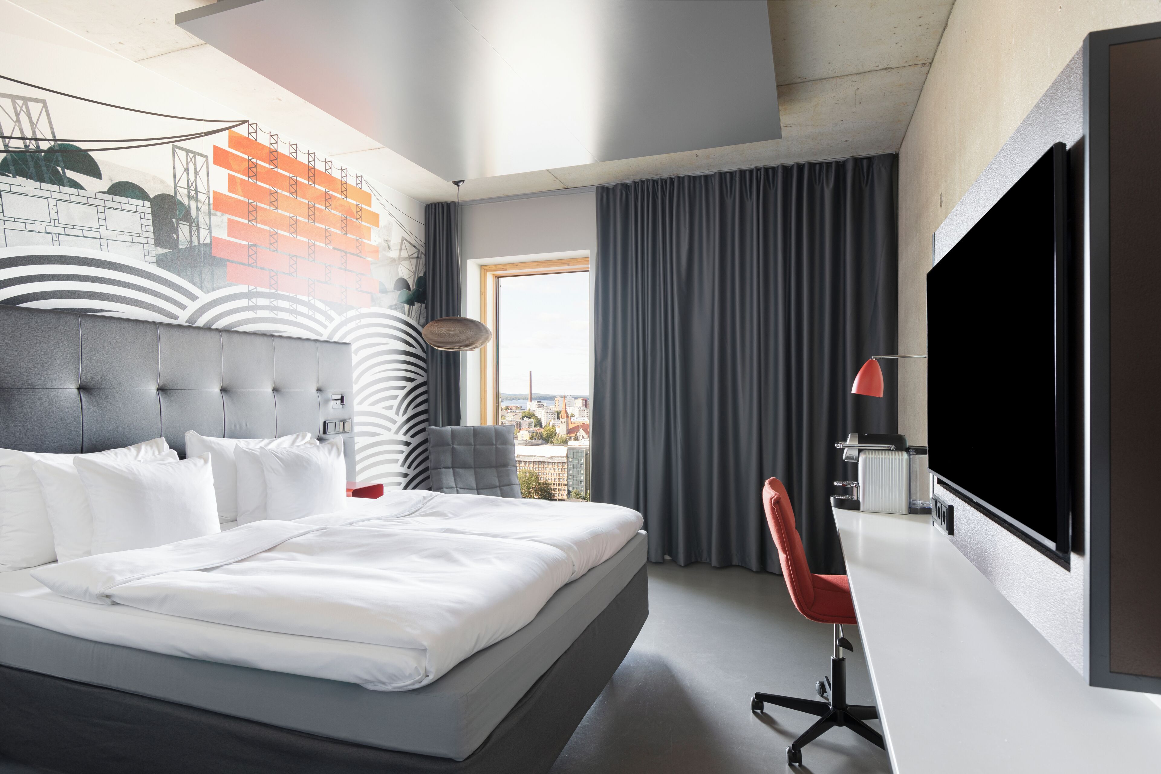 Room, 1 King Bed (Solo Up) | Minibar, in-room safe, individually decorated, desk