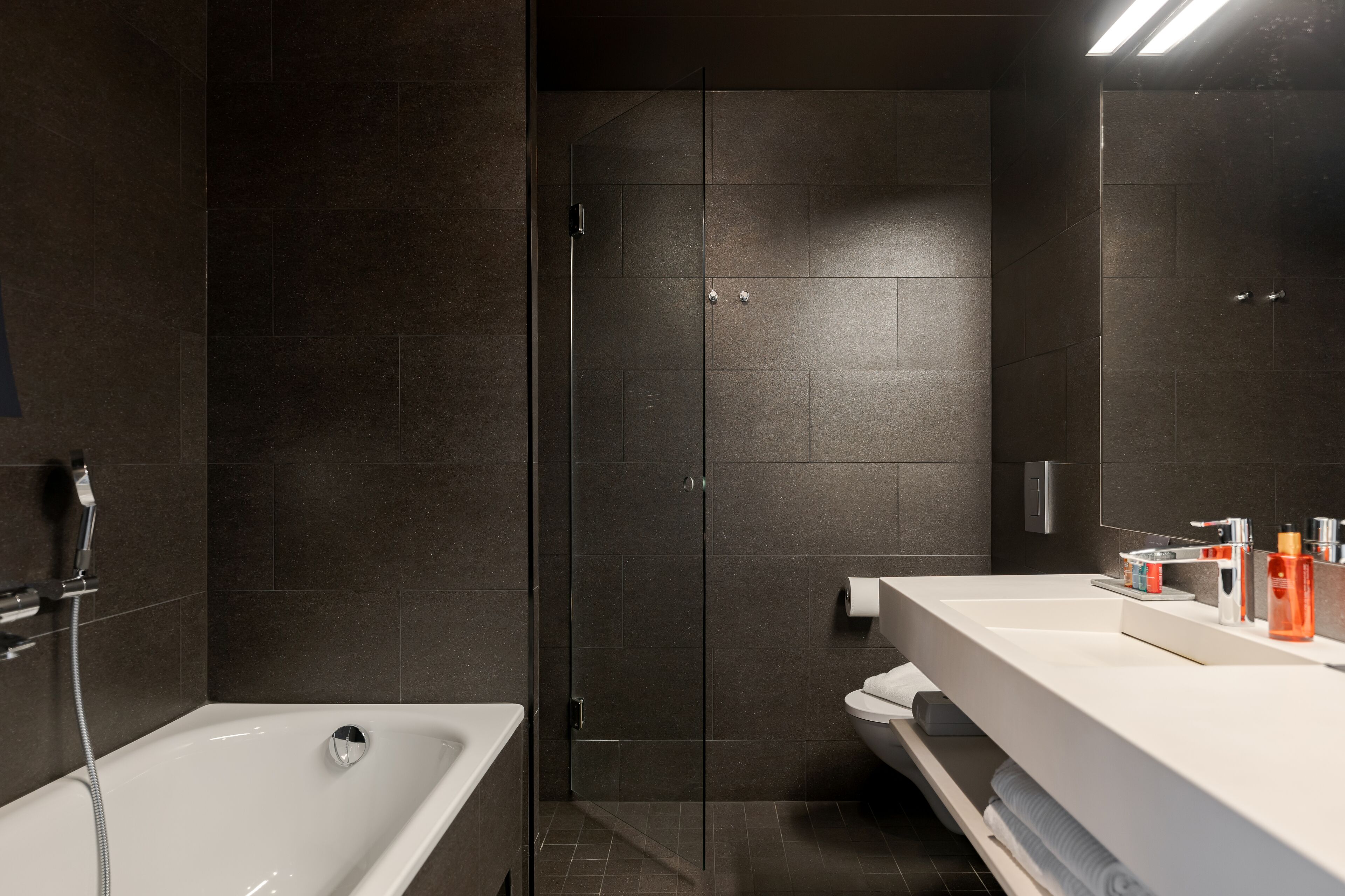 room (solo supreme with divan sofa) | bathroom | shower, free toiletries, hair dryer, towels